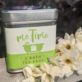 Groovy Goat me time 5 bath tea bags tin next to flowers